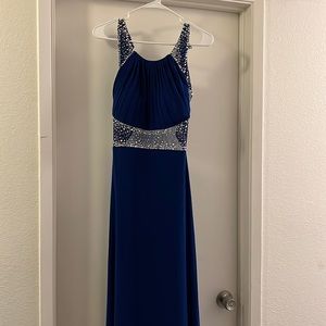 Long dress perfect for prom or weddings! Open back with rhinestones